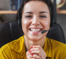 woman in yellow with headset